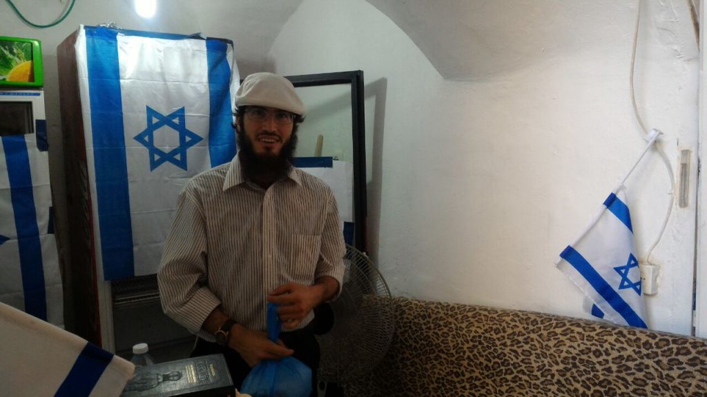 Shaul Gheblikian standing in the newly reclaimed store