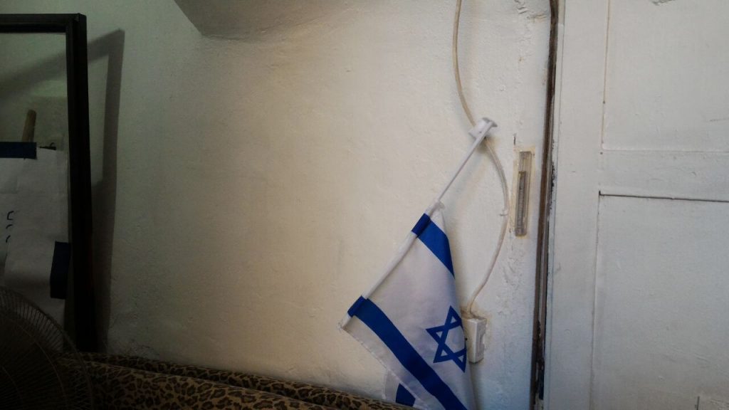 New Mezuzah covering the same spot where it was once fastened
